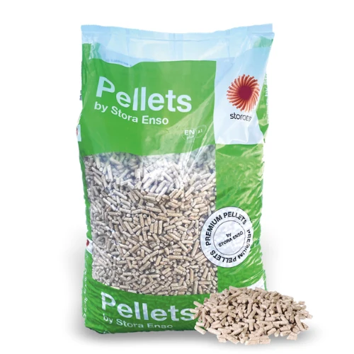 Bag of wood pellets labeled 'Pellets by Stora Enso' with a small heap of pellets in front of the bag