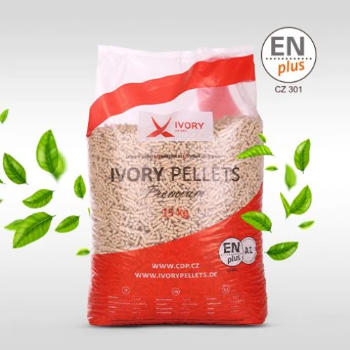 PELLETPLUSS.r.o_20 - ECOPELETY Bag of Ivory Pellets, 15 kg, red and white packaging with EN plus certification, surrounded by green leaves.